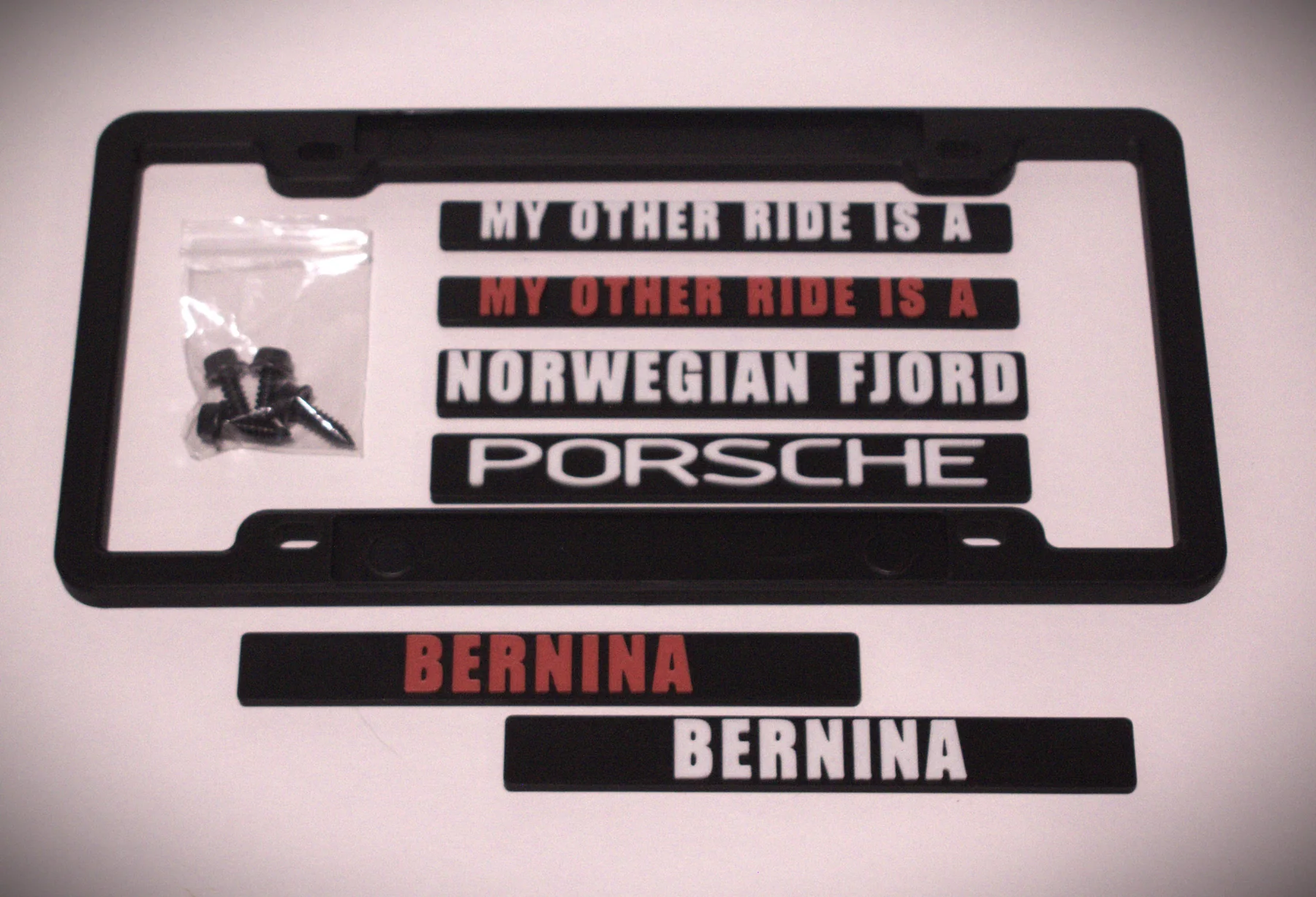 KT-34 magnetic license plate frame with interchangeable personalized text plates