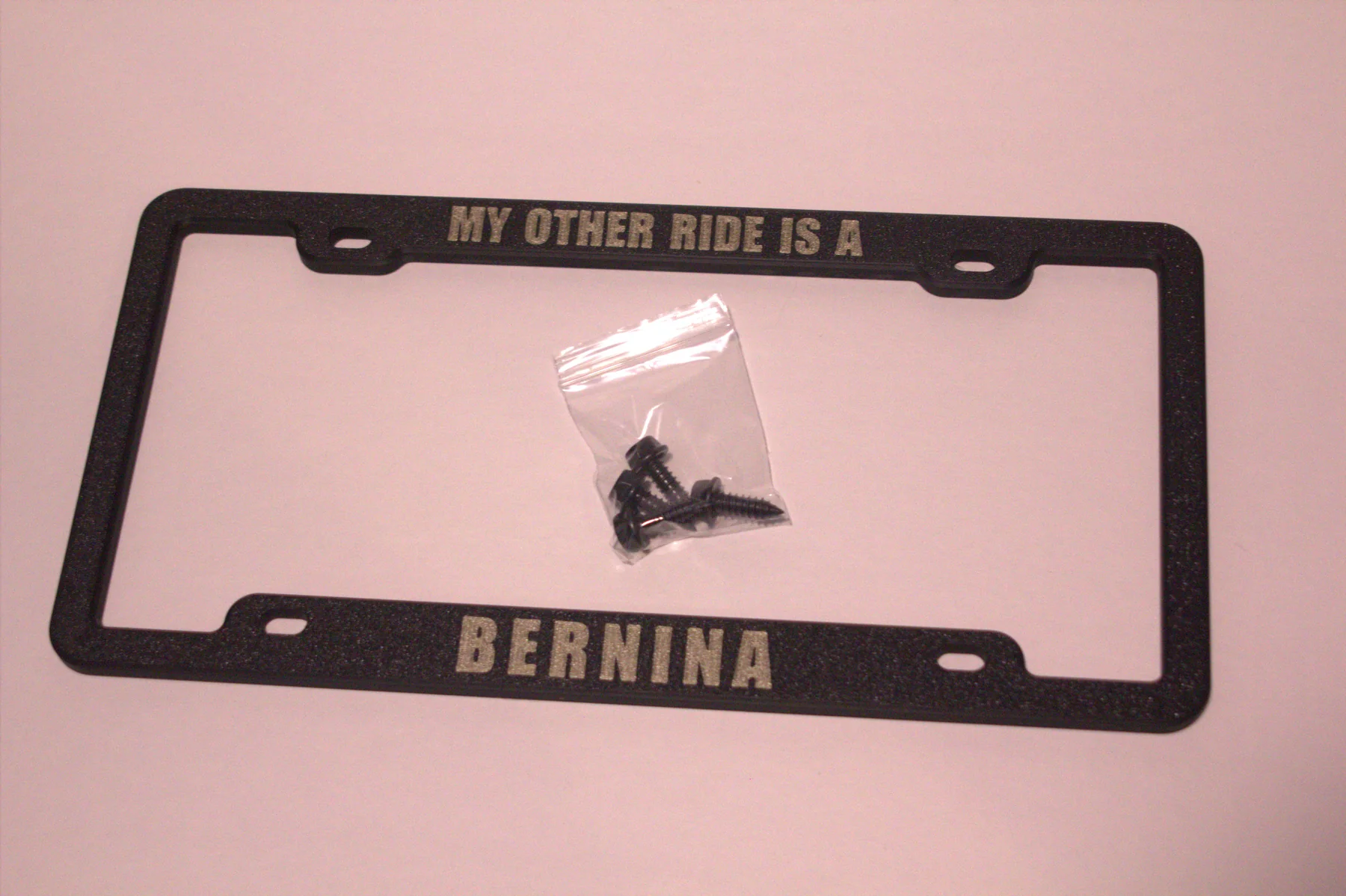 KT-34 standard personalized license plate frame with integrated two-color text
